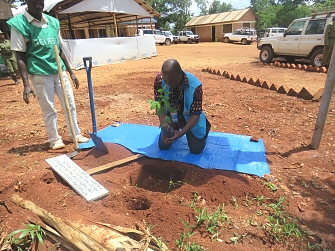 UNHCR Kibondo HoSO representative planting memorial tree at MHA office premises in Nduta camp