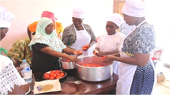 women group doing processing of their products
