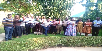 Group photo holding value added products in Kishapu District